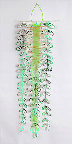 UNTITLED   2014, bone, plastic, duralar, resin, ink & glow-in-the-dark acrylic, 67” x 22” x 10”